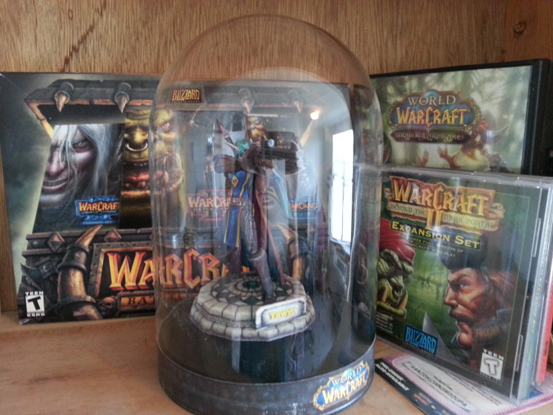 The Warcraft section of my gaming display shelf. Did I mention I have a gaming display shelf? I do. It's big.